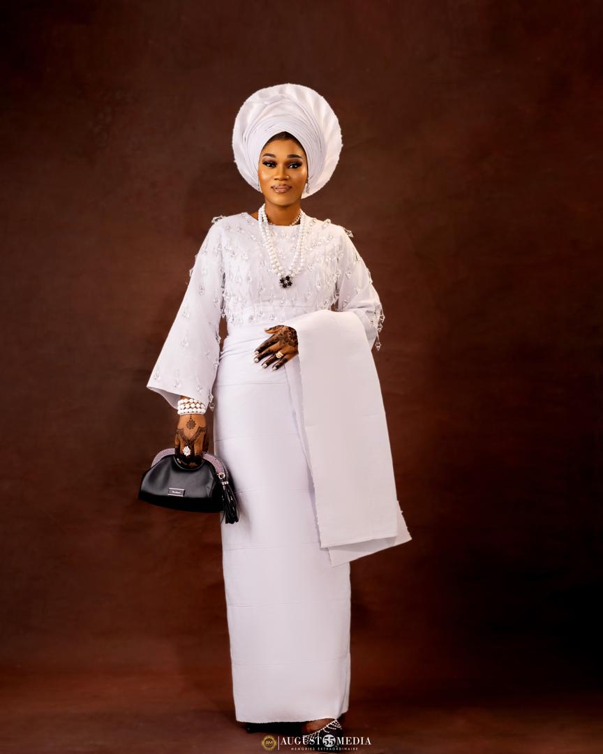 Custom white asoebi with gele and beads