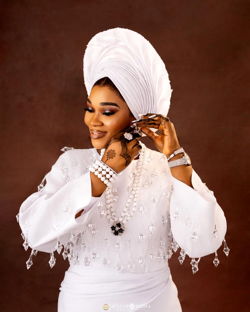 Custom beaded bridal blouse with gele, close up